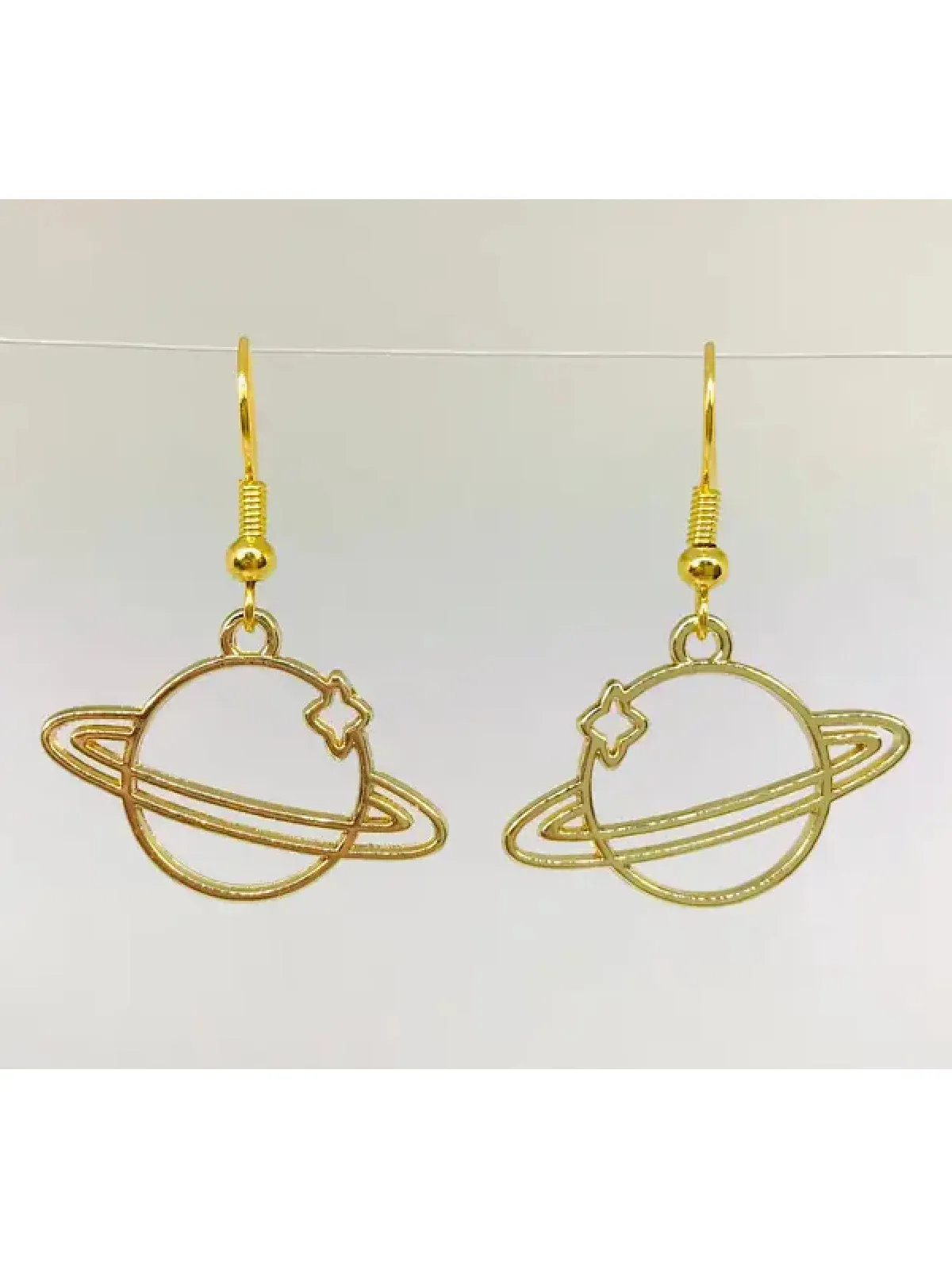 Gold Saturn Outline Dangles